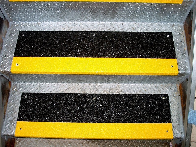 Image of two-tone black and safety yellow Safeguard anti-slip step cover