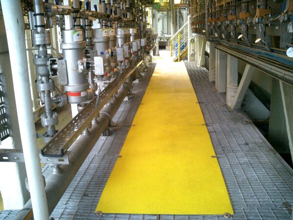 Yellow walkway on gratting